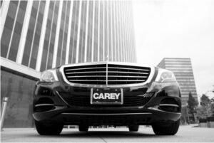 Front view of a black Carey luxury sedan