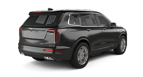 Black SUV car viewed from the rear and side, highlighting tail lights, windows, and XT6 badge