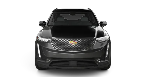 Black SUV car viewed directly from the front, featuring prominent grille, headlights, and the Cadillac logo.