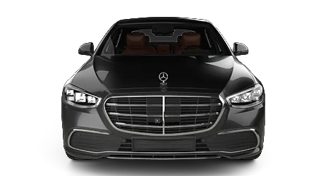 Black Mercedes-Benz sedan viewed directly from the front, featuring large chrome grille, LED headlights, and Mercedes logo