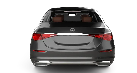 Black Mercedes-Benz sedan viewed directly from the rear, featuring LED tail lights, dual exhausts, and the Mercedes logo badge
